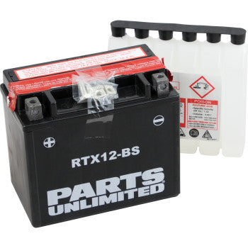 A black Parts Unlimited AGM Battery RTX12 BS .60 L with a red label is in front of a clear acid pack marked with warning symbols, delivering high cranking power and maintenance-free reliability.
