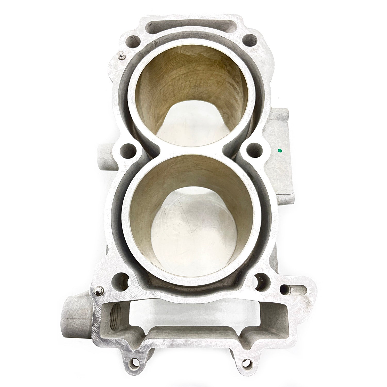 Silver metal cylinder head with two large circular chambers and multiple bolt holes for secure attachment.