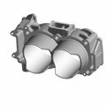 Gray metal cylinder head for Polaris engine with smooth rounded chambers and mounting points.
