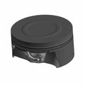 Matte black metal piston with smooth top and visible wrist pin hole.