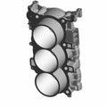 Silver-gray metal cylinder head with three large circular chambers and mounting points.