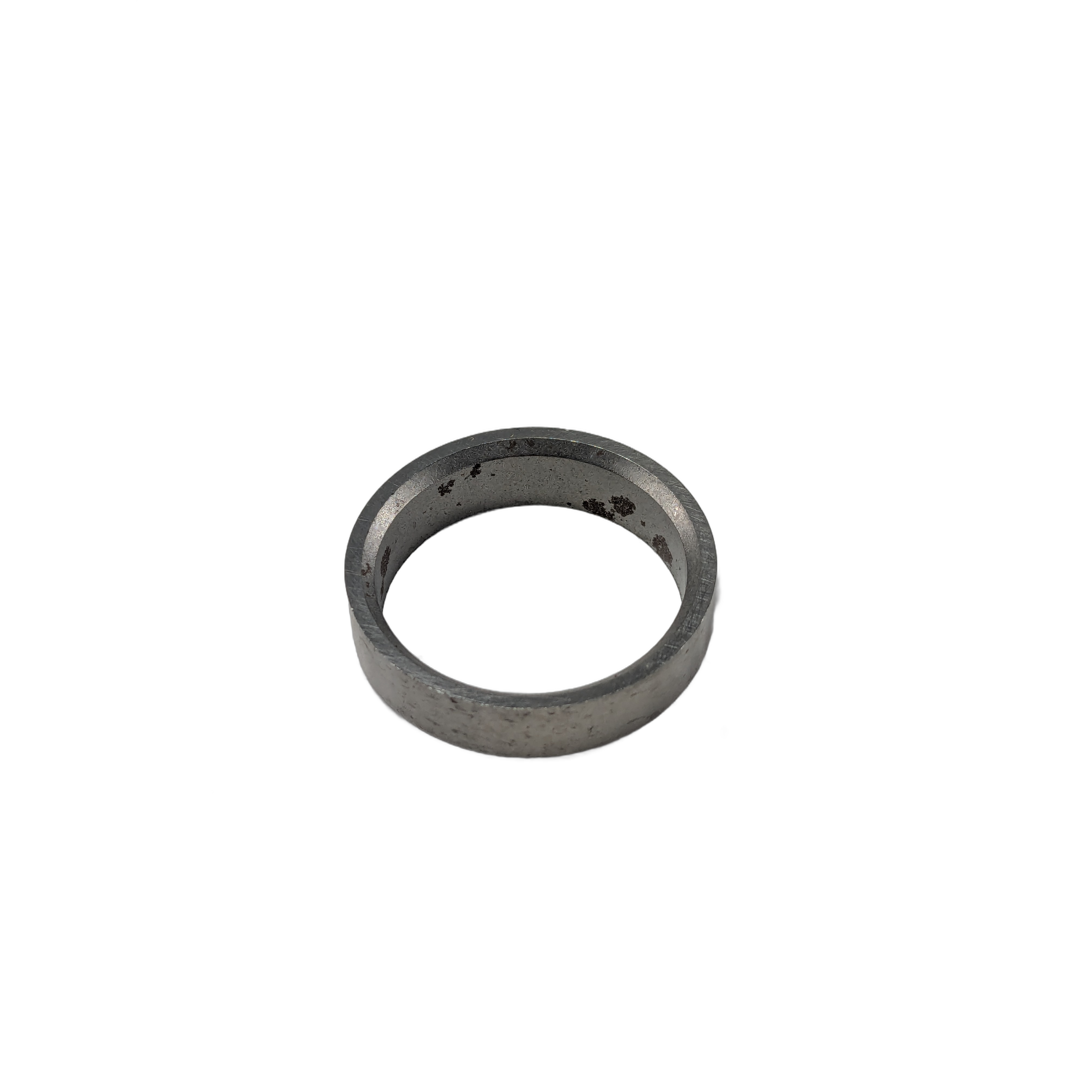 Small metal intake valve seat ring with a smooth circular shape and gray finish.