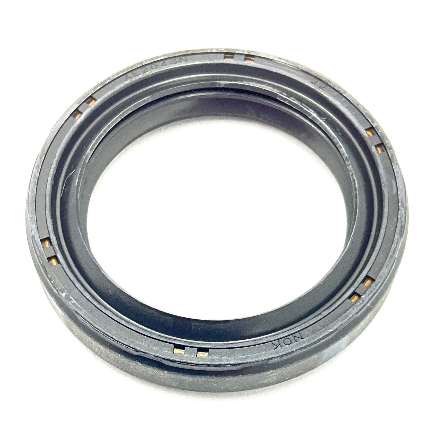 Black rubber oil seal with inner lip and gray outer edge designed for Polaris vehicles.