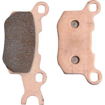 Two Sintered Brake Pads by All Balls are shown side by side: the left reveals the friction surface, and the right displays the backplate with two circular markings. Both feature copper-colored metal parts and distinctive mounting holes.