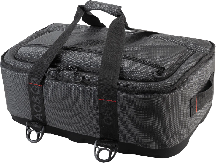 The 38 Pack Capacity Ballistic Stow-N-Go Heavy Duty Cooler by AO Coolers is a grey, rectangular bag with black handles, zippered compartments, reinforced edges, and two metal rings—perfect for organizing outdoor gear.
