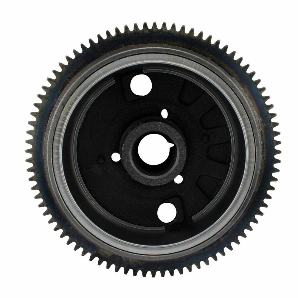 Round black metal flywheel with silver gear teeth around the edge and three bolt holes in the center.