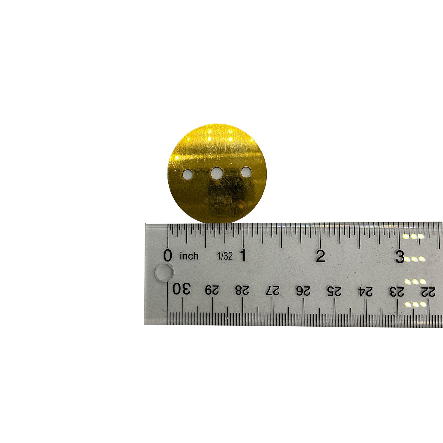 Small round brass throttle valve with two side holes, shown next to a metal ruler for scale.