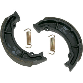 Pair of black curved Yamaha brake shoes with friction lining and two coiled metal springs.