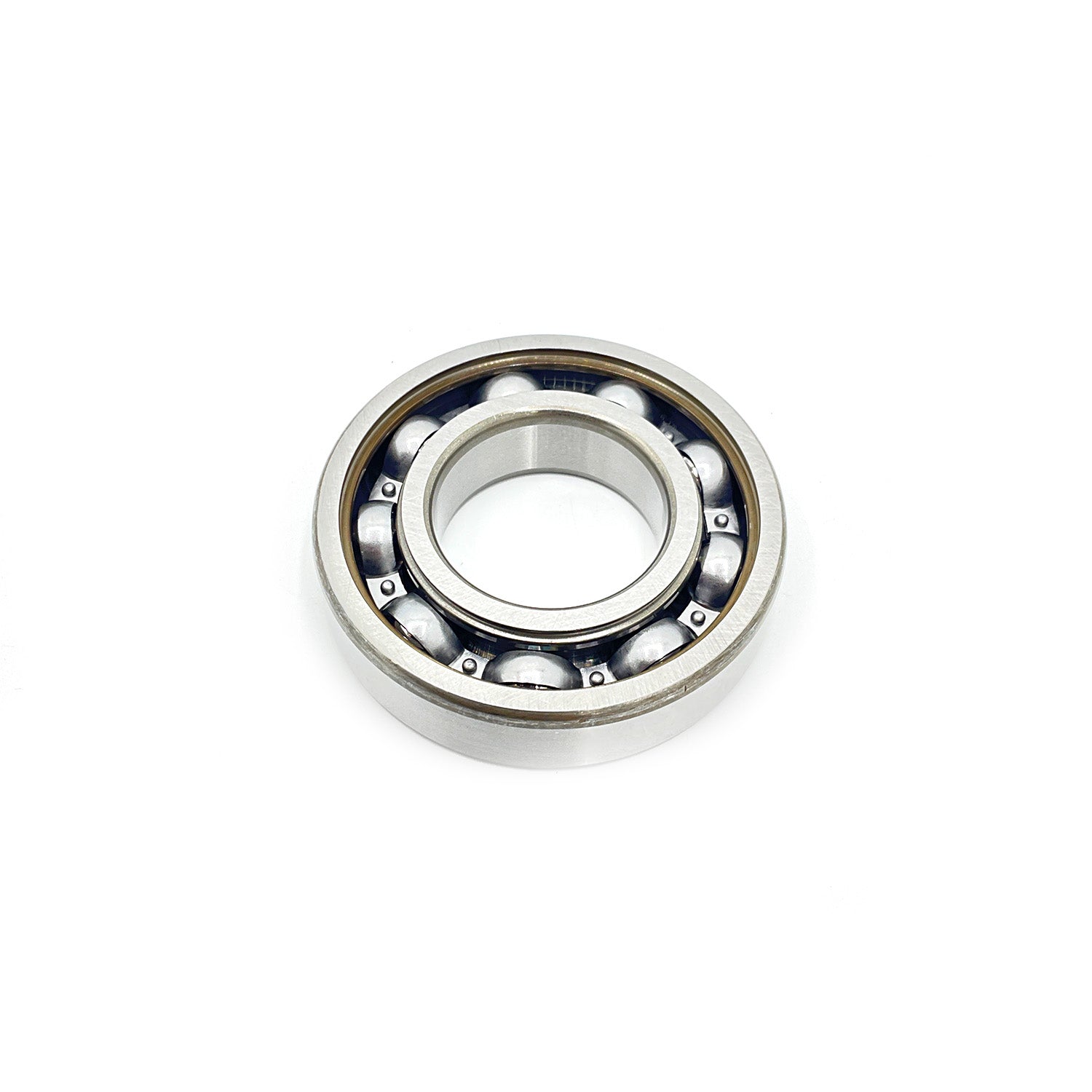 Silver metal ball bearing with exposed steel balls and smooth inner and outer rings.