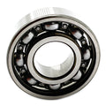 Metal ball bearing with inner and outer rings and visible steel balls in a circular raceway.