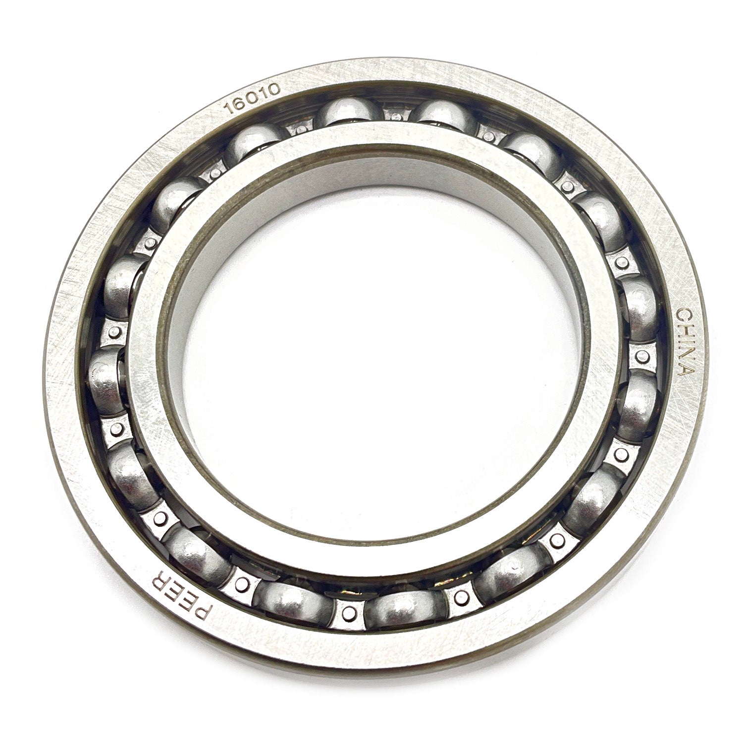 Metal ball bearing with inner and outer rings and visible steel balls evenly spaced around the circumference.