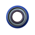 A close-up of the Gear Case Seal by Polaris shows a blue outer ring, metallic inner ring, and dark brown center on white—an essential accessory engineered for optimal ATV performance.