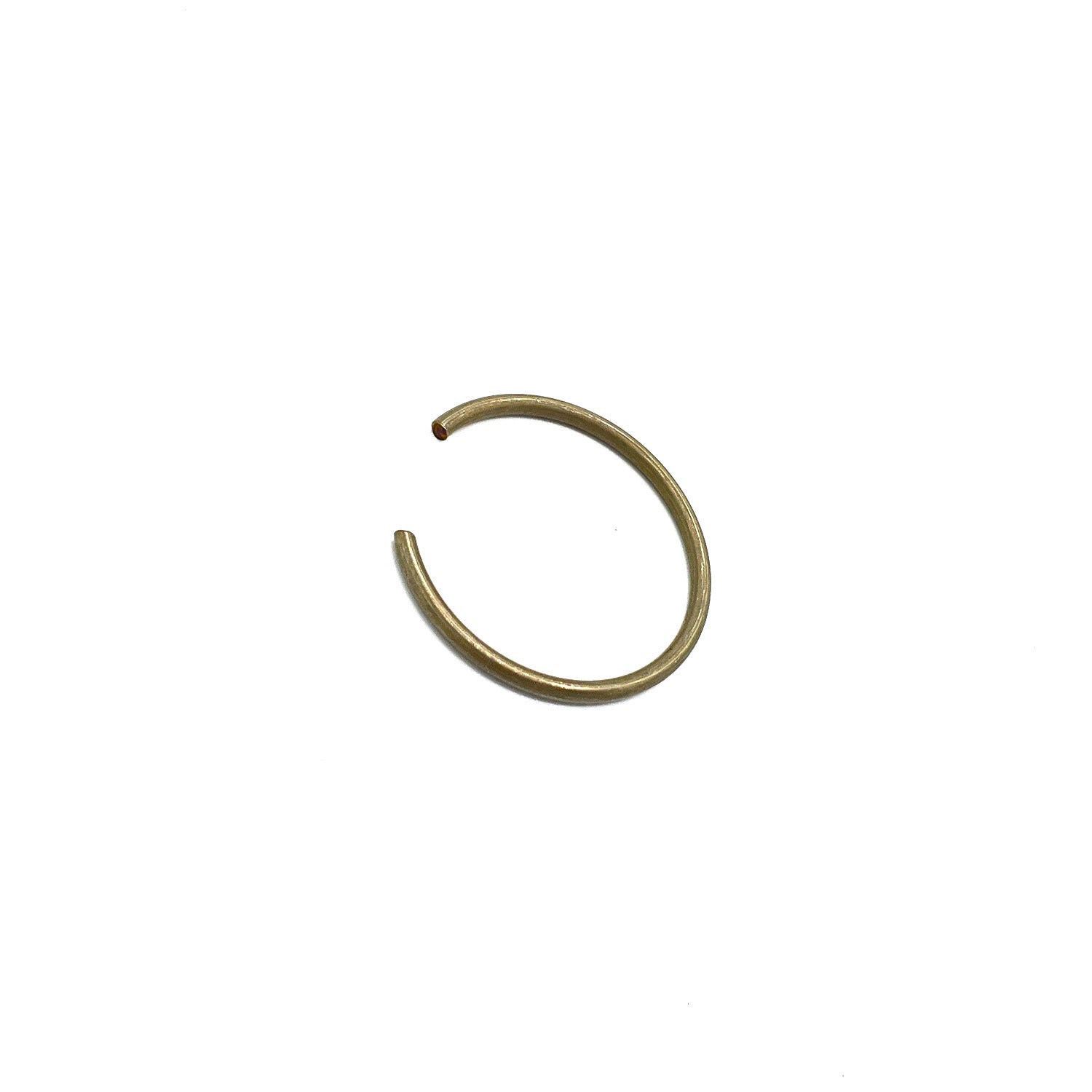 Small circular metal clip with an open gap, gold-toned and smooth finish.