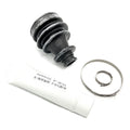 Black rubber CV boot with metal clamp and white grease tube for off-road vehicle maintenance.