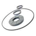 Black rubber and plastic seal repair kit components including a large circular gasket, two smaller seals, and a round.