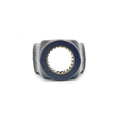 Metal front gearcase yoke with circular splined inner opening, finished in silver-gray steel.