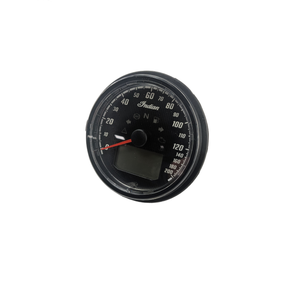 Round black speedometer with white numbering up to 140 mph, red needle, and digital display at bottom center.