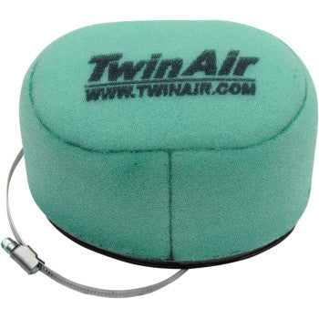 Green oval foam air filter with black Twin Air logo and attached metal clamp band.