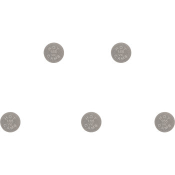 Five small circular metallic valve shims, each stamped with sizing details, arranged on a white background.
