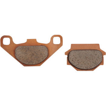 Two Pro MX Sintered Brake Pads by DP Brakes, featuring copper-colored backing plates and textured grey friction surfaces, are displayed side by side against a white background.