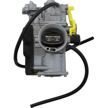 Silver metal Honda replacement carburetor with black hose and yellow throttle lever.
