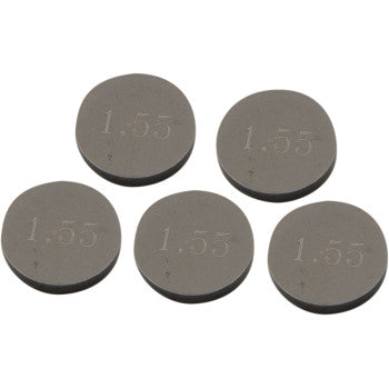 The image displays five Prox Valve Shims, each 9.48 mm x 1.55 mm, arranged on a white background. Precision machined for durability, each metal disc is stamped "1.55." Sold as a pack of five.