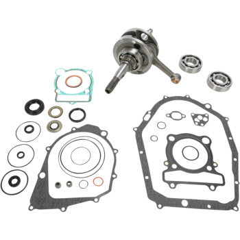 The Yamaha Crankshaft Kit OE Crankshaft Replacement by Hot Rods, featuring a crankshaft, connecting rod, gaskets, seals, and OEM-spec bearings, is displayed neatly on a white background.