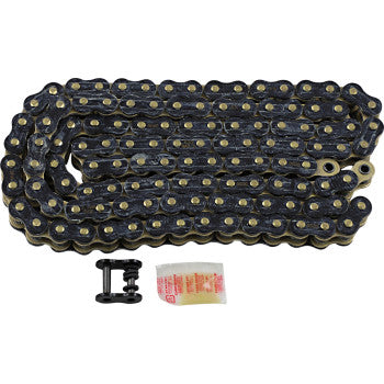 The 530 Max Z Drive Chain 120 Links Black & Gold by RK, featuring a coiled metal RX-ring chain with gold pins, black connecting link, and lubricant packet, is displayed on a white background—perfect for performance street bikes.