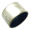 Silver metal cylindrical 1-inch moveable bushing with smooth inner blue lining.