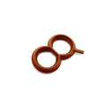 Brown rubber oil filter adapter seal with dual circular rings and small tab extension.
