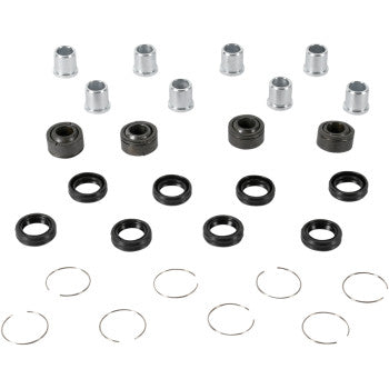 Set of black rubber bearings, silver metal spacers, and wire retaining clips arranged on white background.