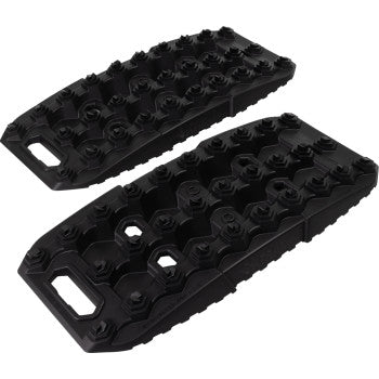 The XTrax Off Road Recovery Boards Black by Caliber are heavy-duty plastic boards with an innovative tread pattern and built-in handles, designed to provide reliable ORV traction and efficient vehicle recovery on off-road terrain.