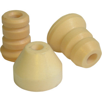 Three KYB Shock Bottom Out Bumpers (14 mm x 42 mm x 55 mm) by Race Tech, beige and cylindrical with varying shapes and grooves, are arranged on a plain white background for automotive suspension and shock maintenance.