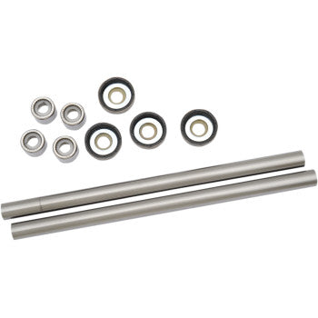 The A-Arm Bearing Kit Front Upper by Pivot Works, featuring two metal rods and eight assorted circular ball bearings, is displayed on a white background.