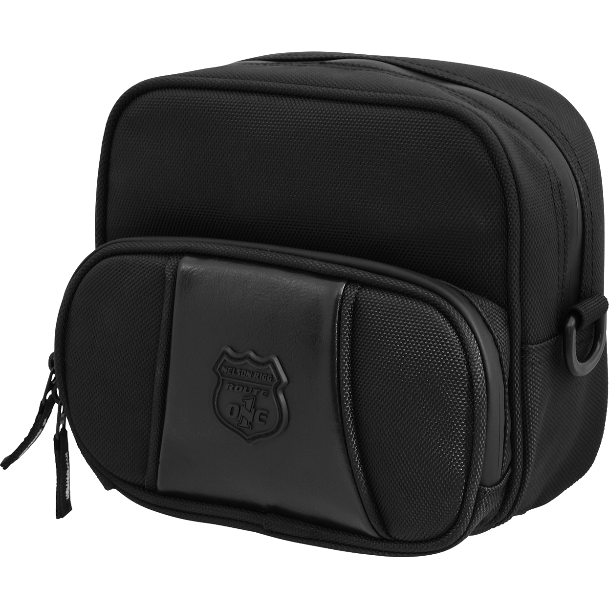 The Route 1 Highway Handlebar Bag 7L Black by Nelson Rigg is a compact black zippered travel bag with two compartments, a textured surface, shield logo patch on the front pocket, and a side loop for carrying.