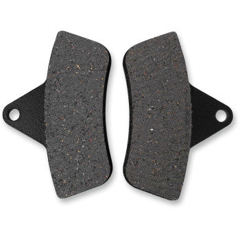 Pair of dark gray, rectangular offroad brake pads with rounded edges and black metal backing plates featuring mounting holes.
