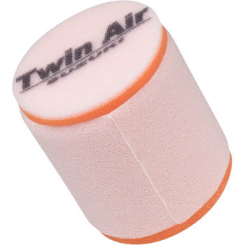 The Suzuki - Arctic Cat Standard Air Filter by Twin Air features a cylindrical pink body with orange edges and a black Twin Air logo on top. Its dual-stage design boosts airflow while protecting your engine from dirt and debris.
