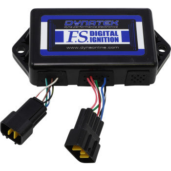 The Kawasaki Non Programmable Ignition System by Dynatek is a black module with a blue and white label, featuring two multi-colored wired connectors designed to increase spark energy.