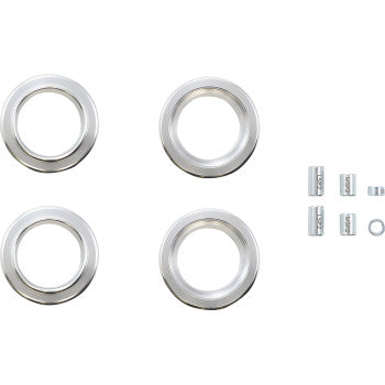 Four silver metal rings and small cylindrical and ring-shaped components are arranged on a white background—these are parts from the Polaris RZR Pro XP Lift Kit by Demon, perfect for enhancing your vehicle's ground clearance.