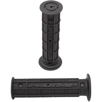 Two black, textured Grips 726 Black by Pro Grip feature a full waffle design with Pro Grip embossed on the side; one stands vertically, the other lies horizontally, both providing excellent vibration absorption.