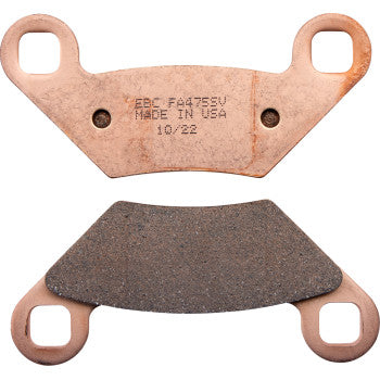Two Brake Pads by Ebc are shown. The top pad features stamped text, while the bottom displays its friction surface. Both pads have two circular mounting holes at each end.