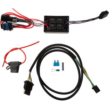 The Trailer Isolator Module - 4-Wire by Namz includes a black relay box, colored wires, connectors, fuses, and a braided cable with plugs—all neatly displayed on a white background.