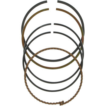 Set of five metal piston rings in varying sizes with a dark finish and one textured ring.