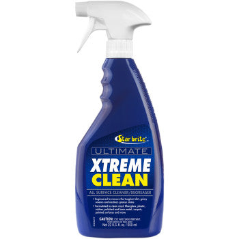 Blue plastic spray bottle with white trigger nozzle labeled Star Brite Ultimate Xtreme Clean cleaner.