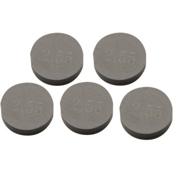 Five precision-machined Prox Valve Shims, 9.48 mm x 2.55 mm, are arranged in a loose pattern on a white background; each metal disc is engraved with "2.55". This is the Prox 5-pack for maximum durability.