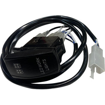 The Brite-Lites Rocker Switch with Connector Cube Light features a black LED work light, an attached wire harness, and a white plastic connector coiled neatly on a white background.