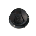 Black circular ignition switch and fuel cap lock with embossed Indian logo and attached keys.