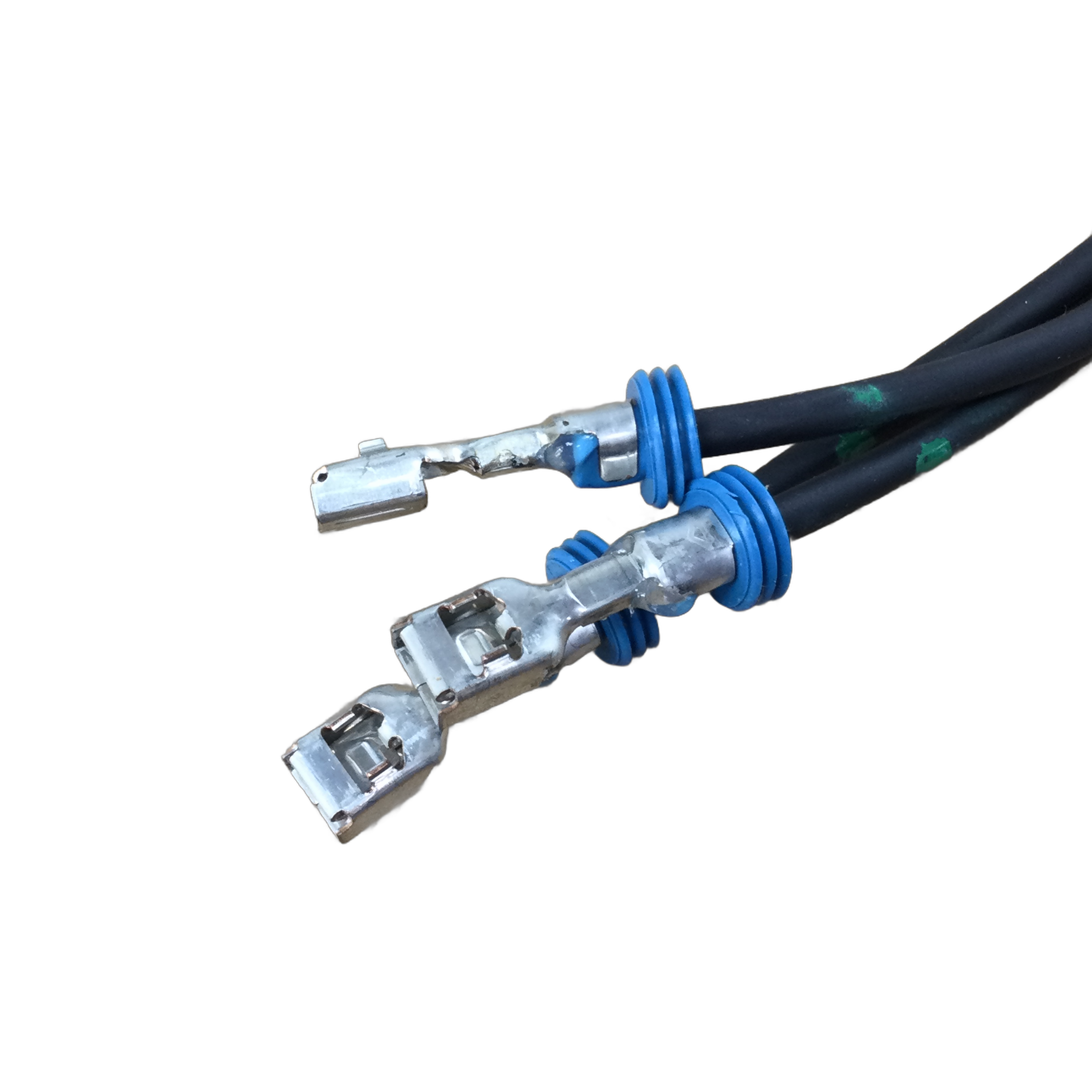 Close-up of two black electrical wires with blue rubber grommets and metal crimp terminals for Stator by Polaris—perfect for those needing genuine Polaris parts or Indian motorcycle OEM components. Shown on a white background.
