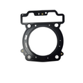 A black Cylinder Head Gasket by Can-Am with multiple holes and a large central opening, displayed on white—a vital part for Can-Am UTVs and compatible ATV accessories.