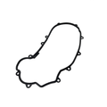 Black rubber gasket with multiple mounting holes, irregular oval shape for sealing components.